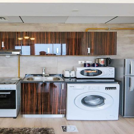 Oyo 860 Studio Apartment, Maya Tower 4, Jumeirah Village Triangle Dubai Buitenkant foto