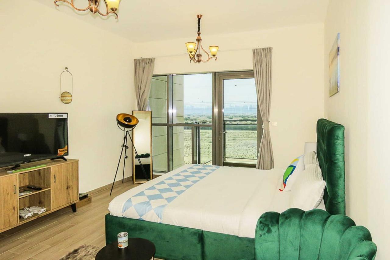 Oyo 860 Studio Apartment, Maya Tower 4, Jumeirah Village Triangle Dubai Buitenkant foto