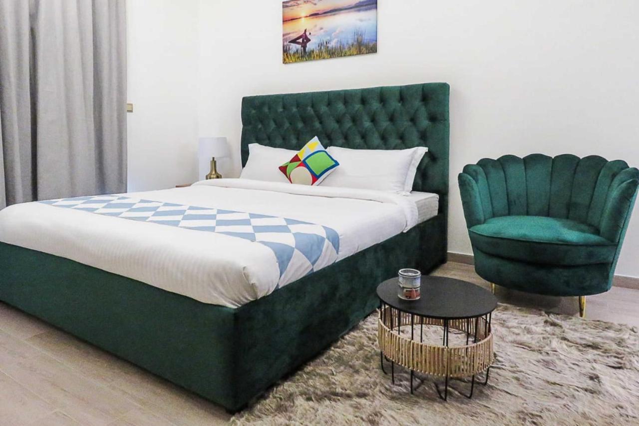 Oyo 860 Studio Apartment, Maya Tower 4, Jumeirah Village Triangle Dubai Buitenkant foto