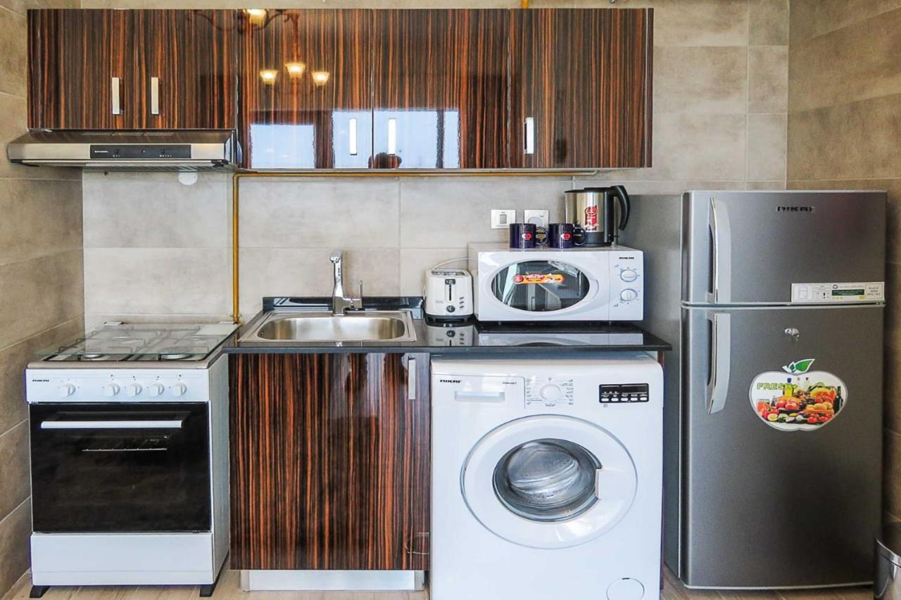 Oyo 860 Studio Apartment, Maya Tower 4, Jumeirah Village Triangle Dubai Buitenkant foto
