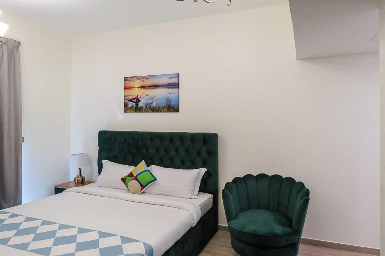 Oyo 860 Studio Apartment, Maya Tower 4, Jumeirah Village Triangle Dubai Buitenkant foto