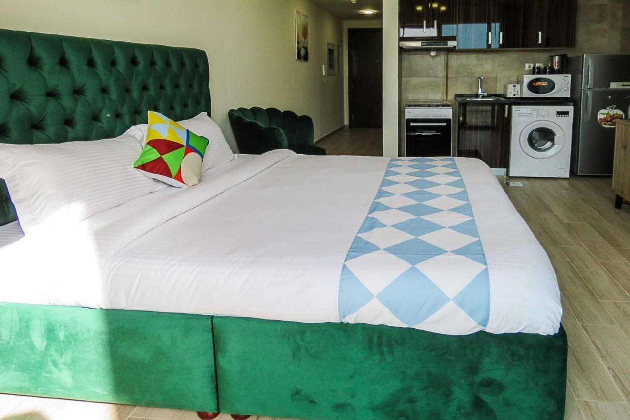 Oyo 860 Studio Apartment, Maya Tower 4, Jumeirah Village Triangle Dubai Buitenkant foto