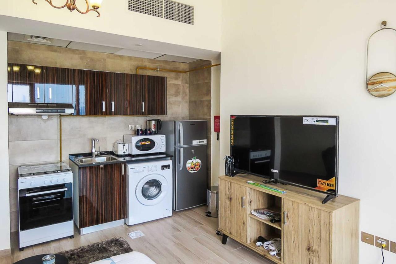 Oyo 860 Studio Apartment, Maya Tower 4, Jumeirah Village Triangle Dubai Buitenkant foto