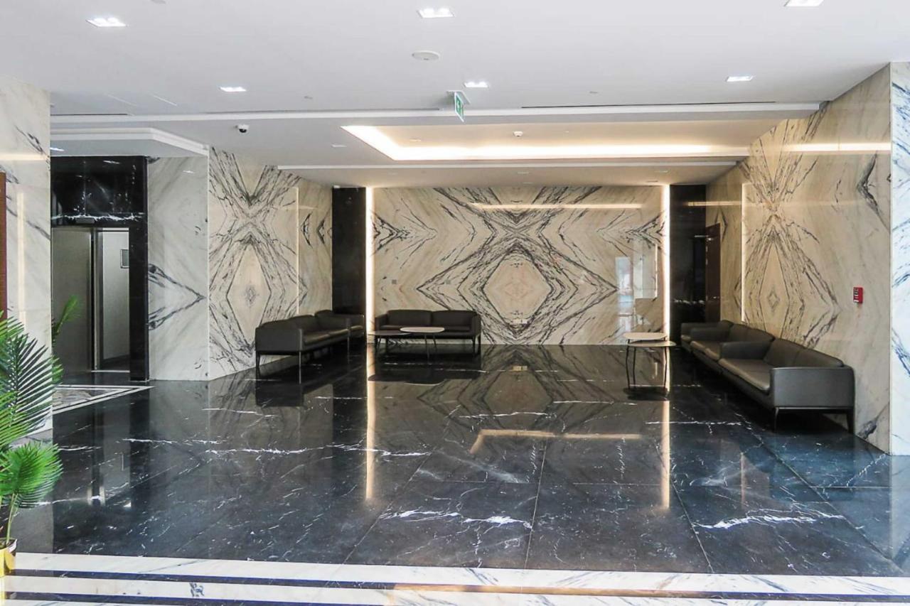 Oyo 860 Studio Apartment, Maya Tower 4, Jumeirah Village Triangle Dubai Buitenkant foto