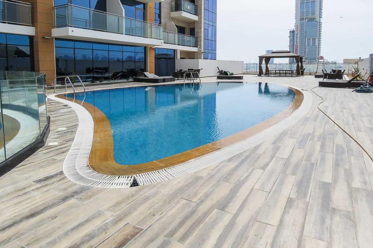 Oyo 860 Studio Apartment, Maya Tower 4, Jumeirah Village Triangle Dubai Buitenkant foto