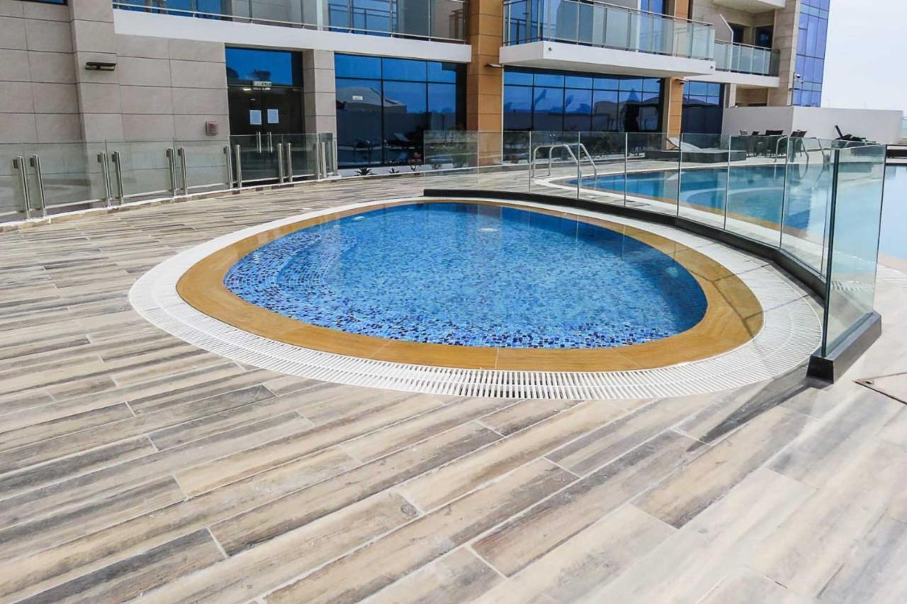 Oyo 860 Studio Apartment, Maya Tower 4, Jumeirah Village Triangle Dubai Buitenkant foto