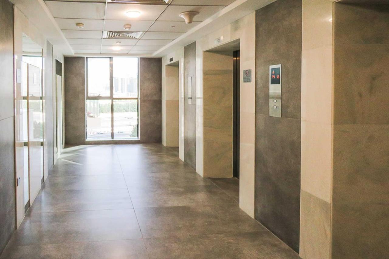 Oyo 860 Studio Apartment, Maya Tower 4, Jumeirah Village Triangle Dubai Buitenkant foto